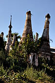 Inle Lake Myanmar. Indein, a cluster of ancient stupas  ruined and overgrown with bushes, just behind the village.